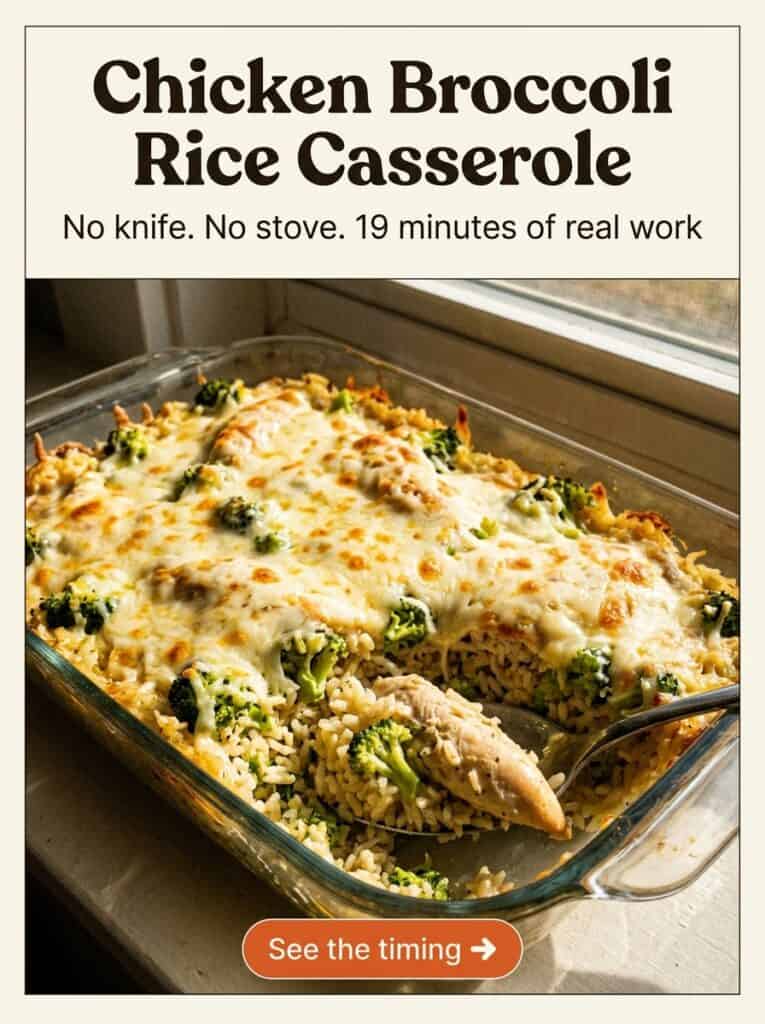 Chicken broccoli rice casserole in a glass 9x13 dish, with a no-knife, timed dump-and-bake recipe title